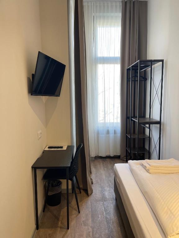 Postel nebo postele na pokoji v ubytování Motel Blue
