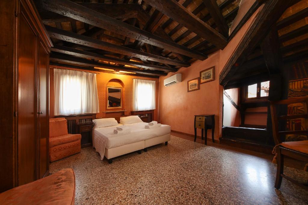 Posteľ alebo postele v izbe v ubytovaní Locanda Antica Venezia