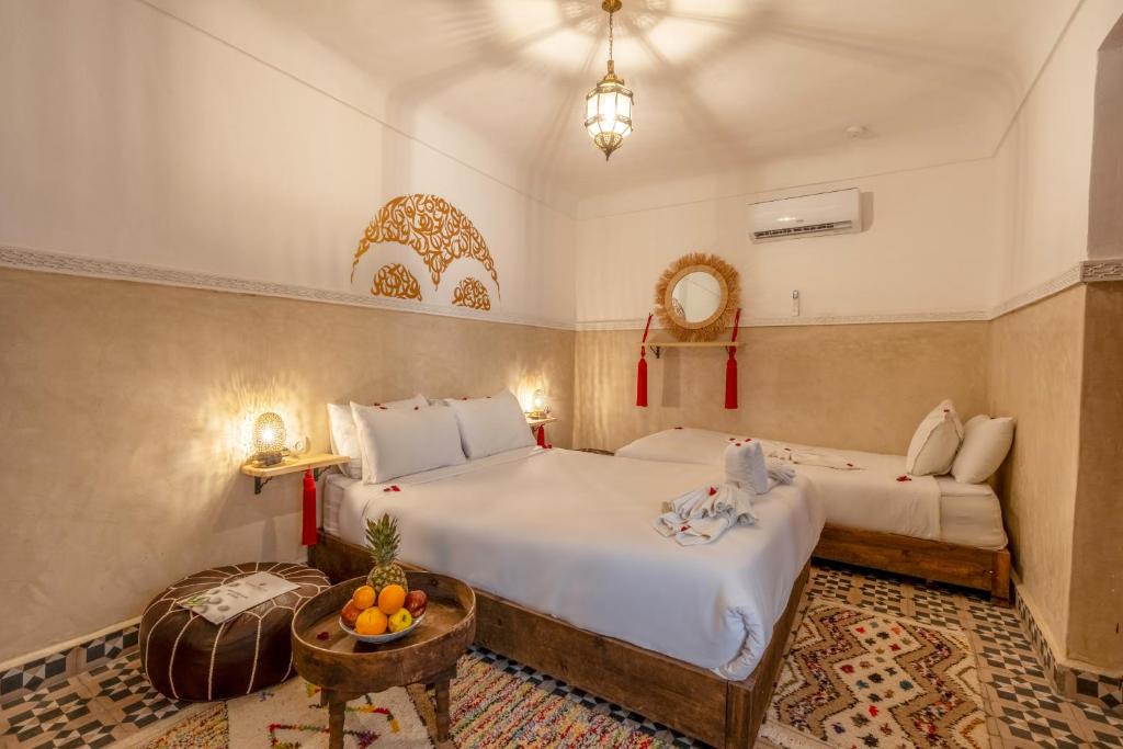 Postel nebo postele na pokoji v ubytování Riad Mokha Mokha & Spa