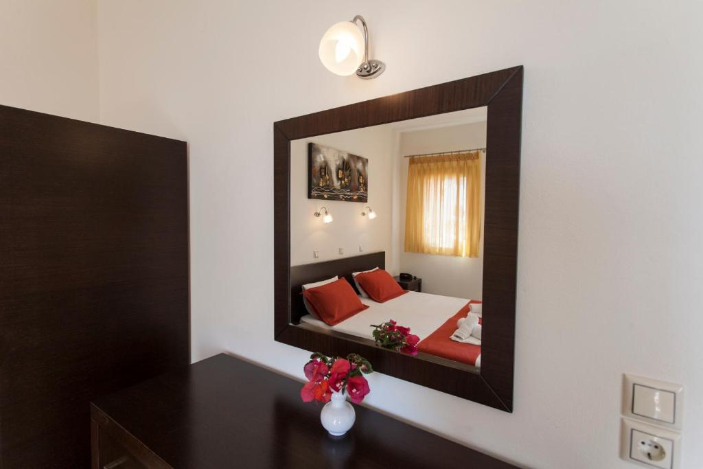 Postel nebo postele na pokoji v ubytování Siarbas Hotel