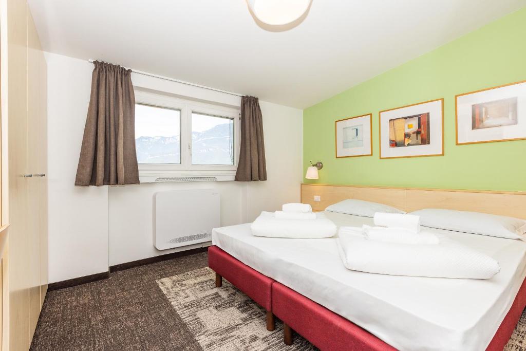 Postel nebo postele na pokoji v ubytování Hotel Heide Park