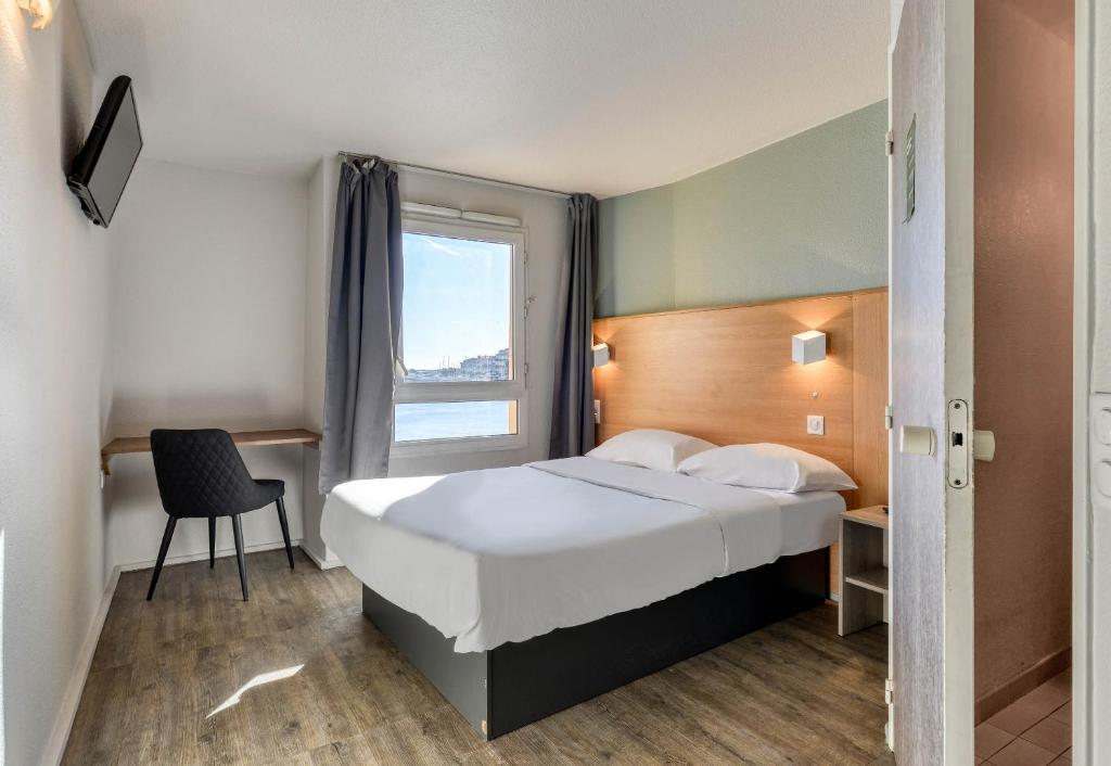Postel nebo postele na pokoji v ubytování B&B HOTEL Sète Centre Gare
