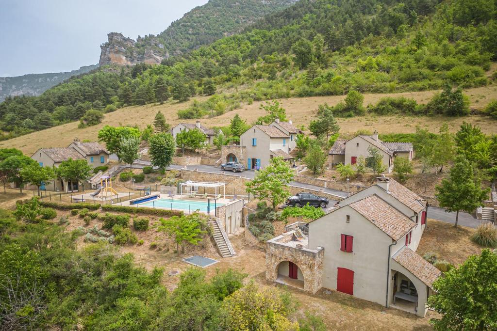 an aerial view of a home in a mountain at Gîte Logement 2/4 personnes - Village de gites des Vignes in Les Vignes