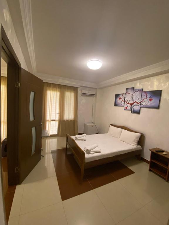 Postel nebo postele na pokoji v ubytování Hotel Ritsa