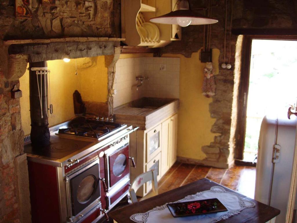 Kuchyň nebo kuchyňský kout v ubytování Podere Casina Rossa