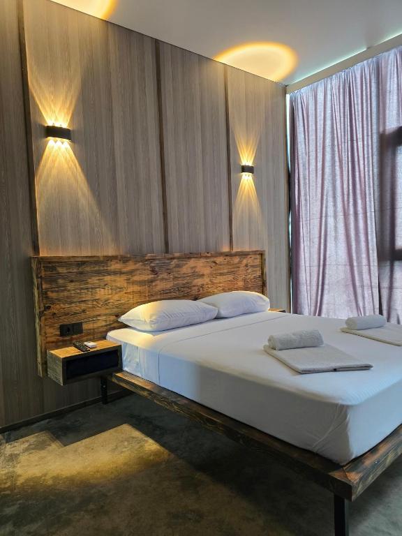 Postel nebo postele na pokoji v ubytování Comfortium