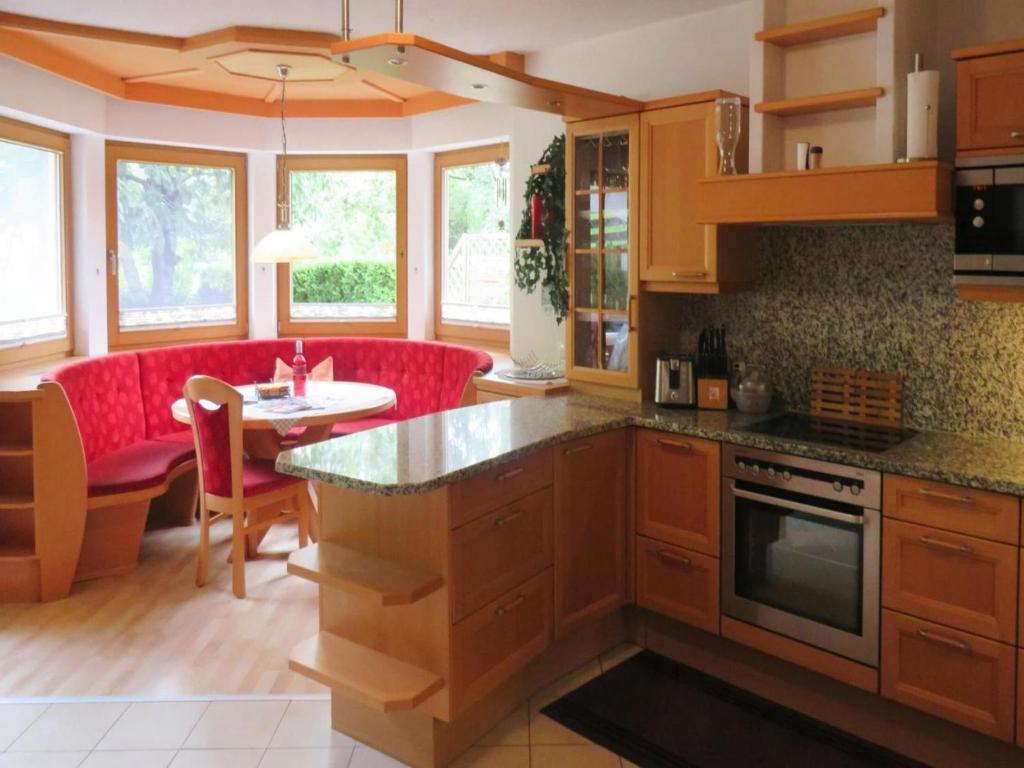 A kitchen or kitchenette at holiday home Emberger, Fügen