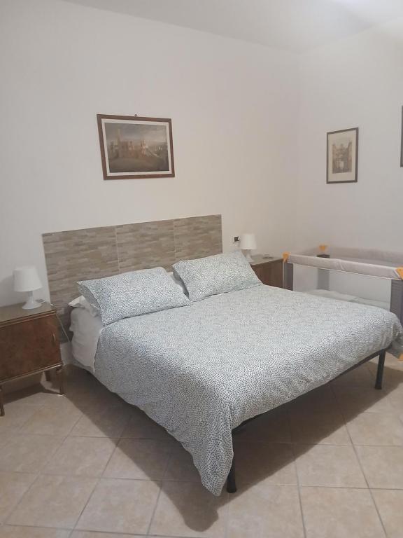 Postel nebo postele na pokoji v ubytování Casa Cencioni