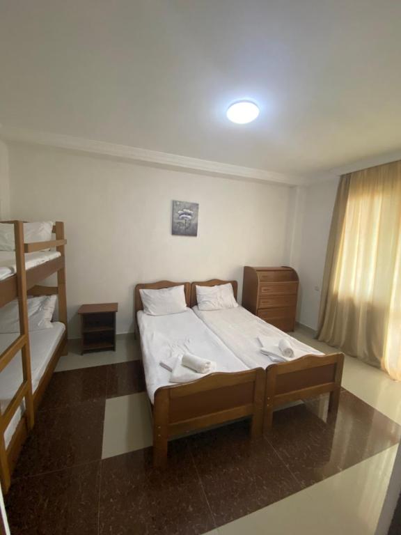 Postel nebo postele na pokoji v ubytování Hotel Ritsa