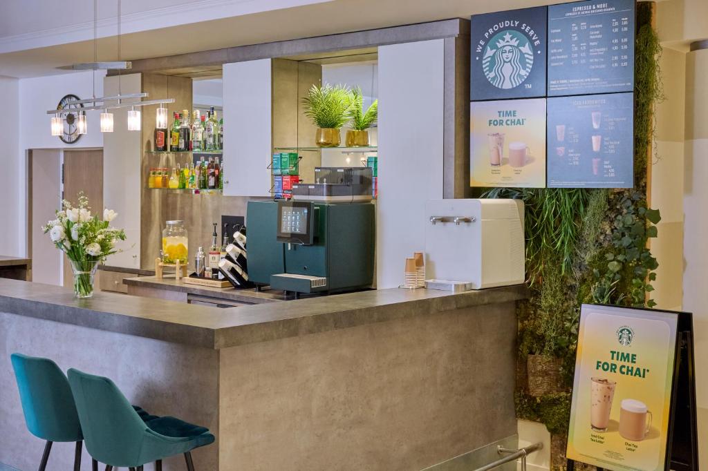 Boissons dans l'établissement Fraser Suites Paris La Défense