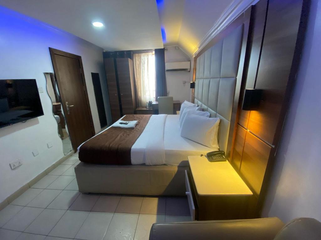 Postel nebo postele na pokoji v ubytování Presken Hotel and Resorts MOJIDI