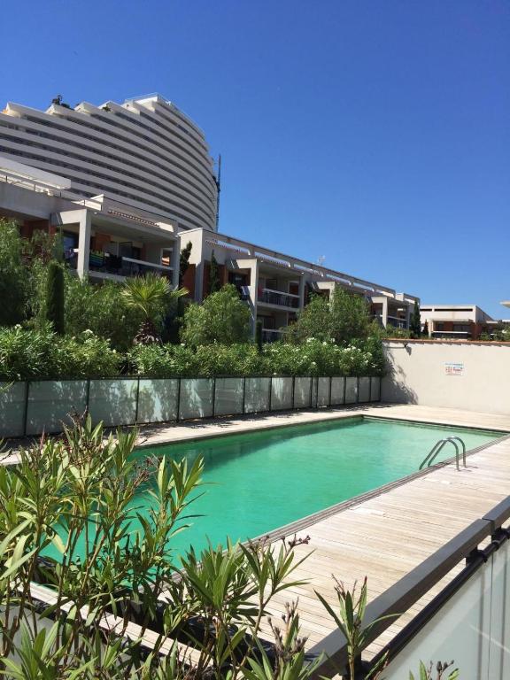 Photo de la galerie de l'établissement Tabarly 4 Pers AC Swimming Pool 2 Bedrooms, à Villeneuve-Loubet