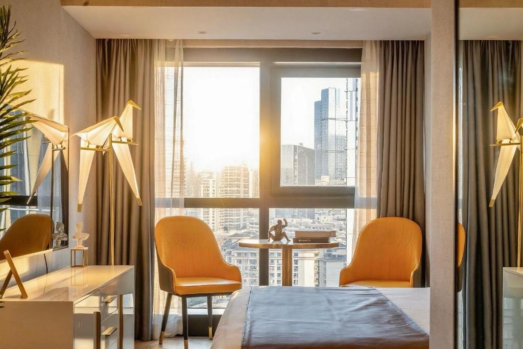 Posezení v ubytování Yomanjoo City View Hotel - Shenzhen Nanshan Coastal City Flagship Store