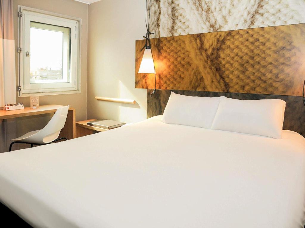 Postel nebo postele na pokoji v ubytování ibis Avignon Centre Gare