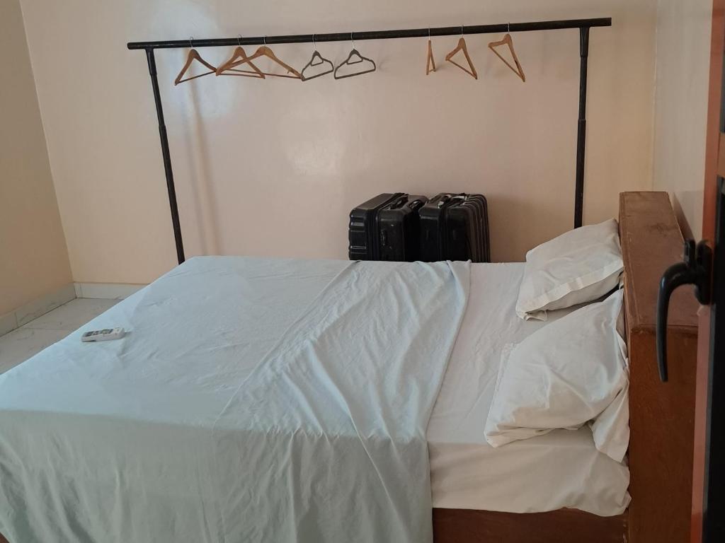 Ένα ή περισσότερα κρεβάτια σε δωμάτιο στο Appartement F4 Chambre double