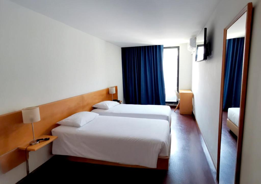 Postel nebo postele na pokoji v ubytování Room & Go by Lince
