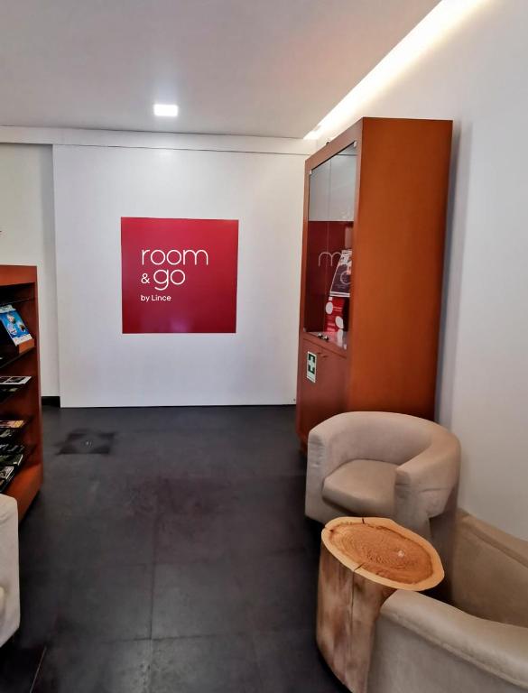 TV a/nebo společenská místnost v ubytování Room & Go by Lince