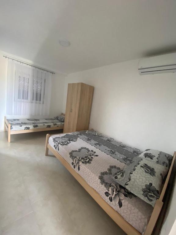 Postel nebo postele na pokoji v ubytování Apartments Beho