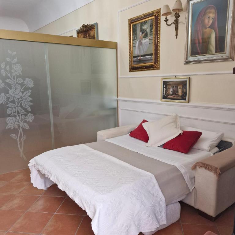 Posteľ alebo postele v izbe v ubytovaní La casa di Dante