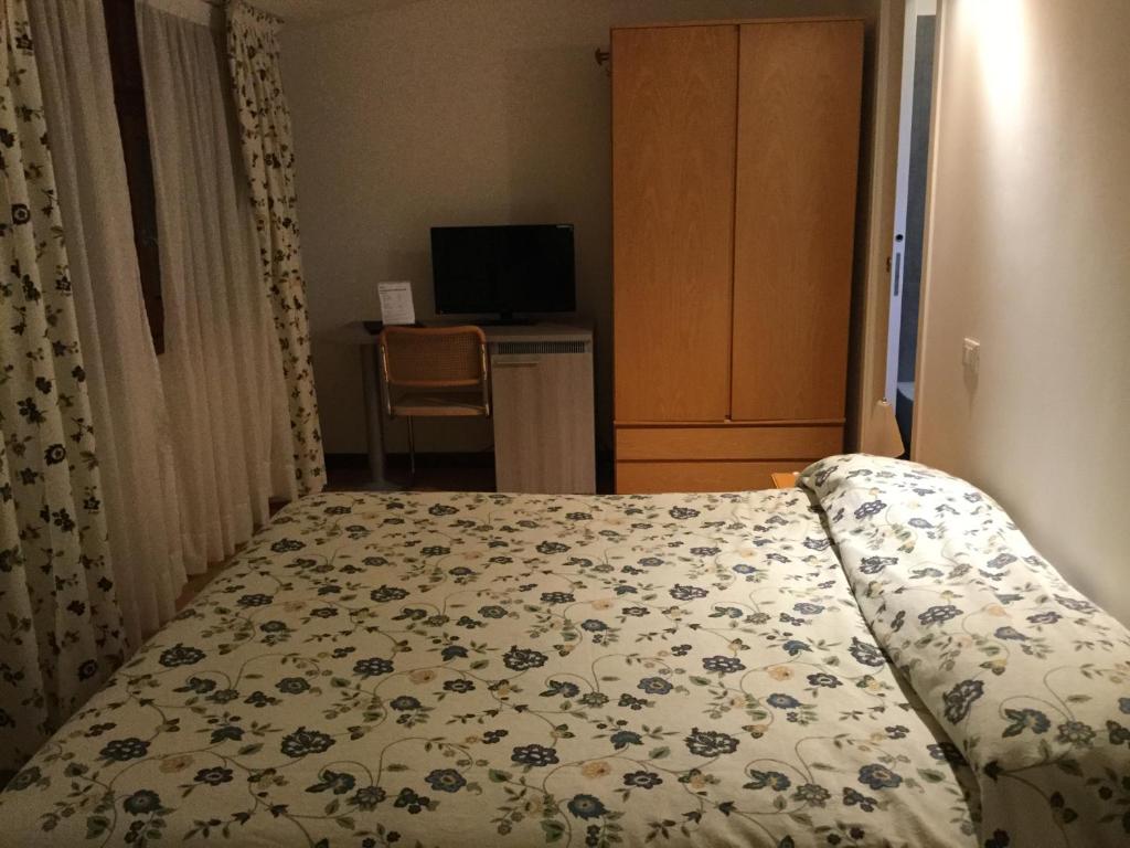 Postel nebo postele na pokoji v ubytování Albergo Belvedere