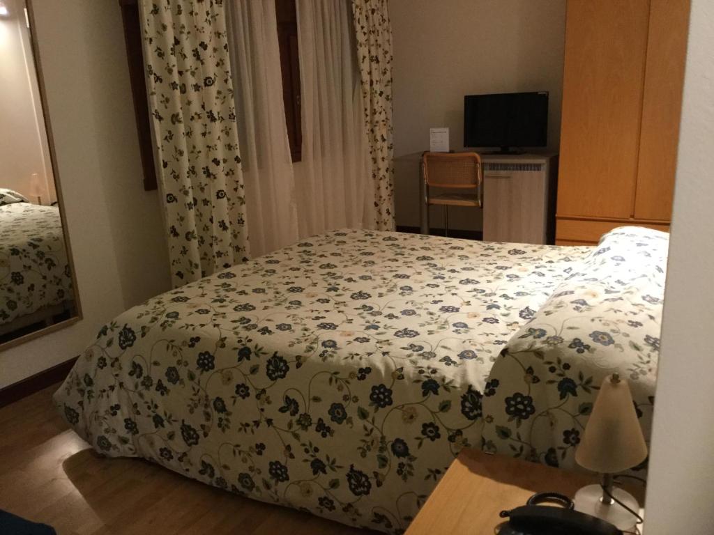 Postel nebo postele na pokoji v ubytování Albergo Belvedere