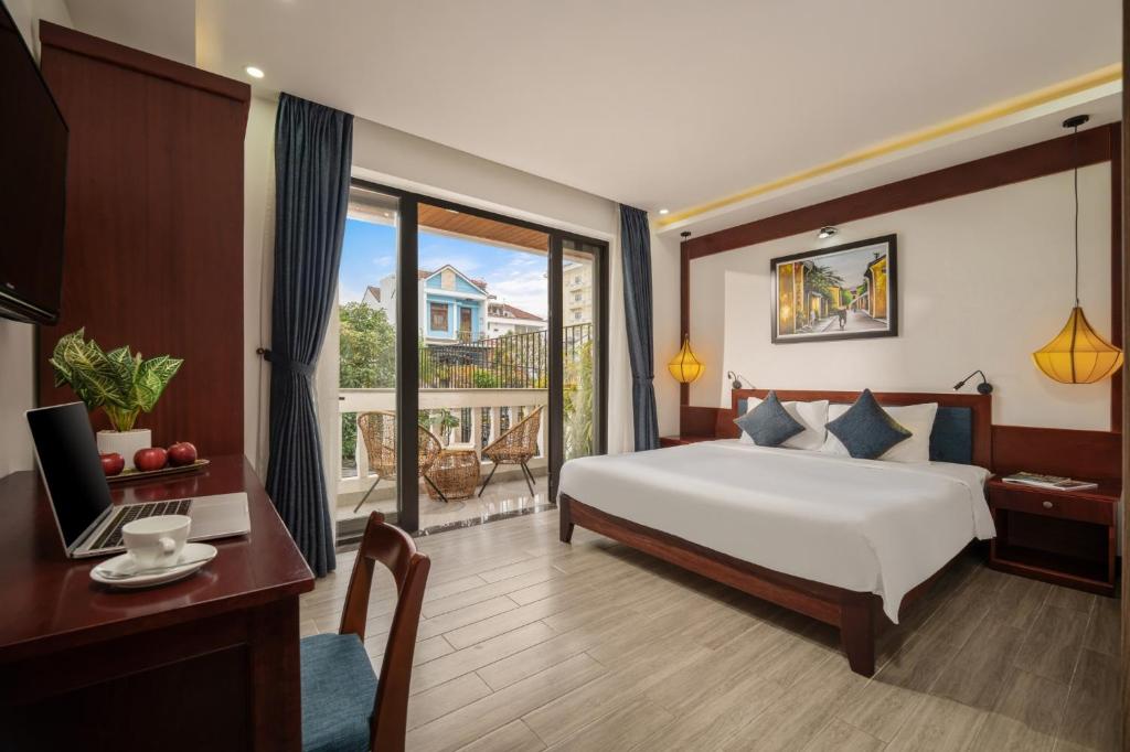 Postel nebo postele na pokoji v ubytování An Hotel
