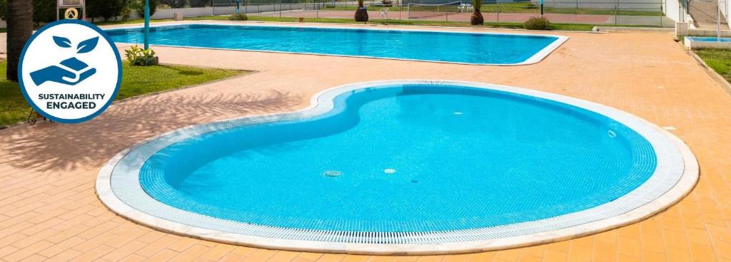 Πισίνα στο ή κοντά στο Apartment Curitiba by Algarve Vacation