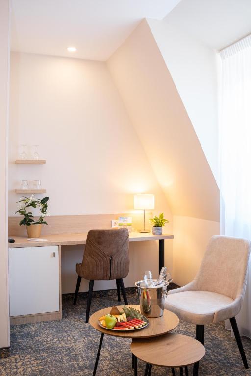 Posezení v ubytování Kikelet Club Hotel