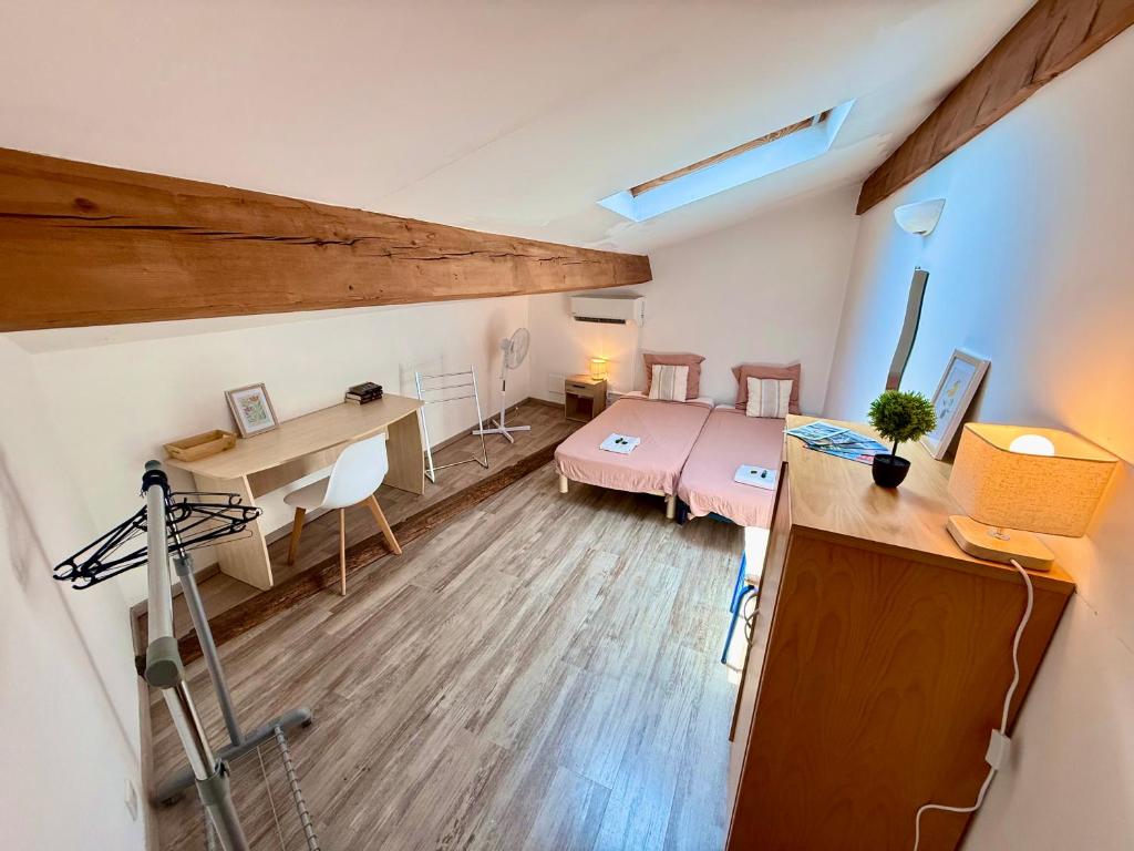 Postel nebo postele na pokoji v ubytování Ô'Berge & Chambres Avignon