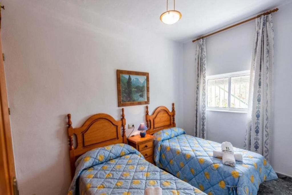 Postel nebo postele na pokoji v ubytování Villa Casa Leo