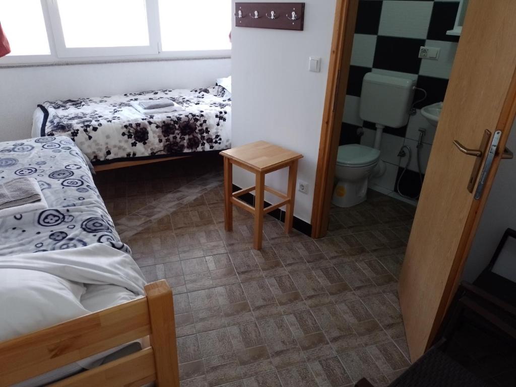 Postel nebo postele na pokoji v ubytování TRIO sobe