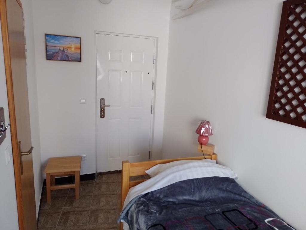 Postel nebo postele na pokoji v ubytování TRIO sobe