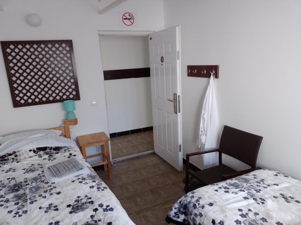 Postel nebo postele na pokoji v ubytování TRIO sobe