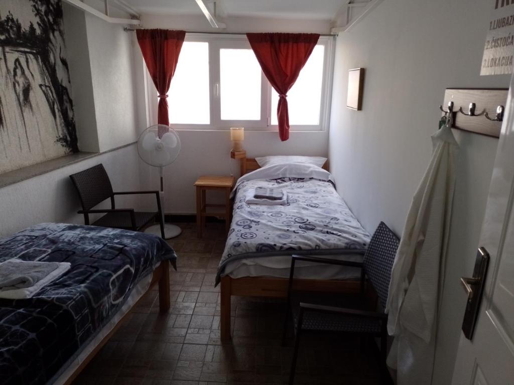 Postel nebo postele na pokoji v ubytování TRIO sobe