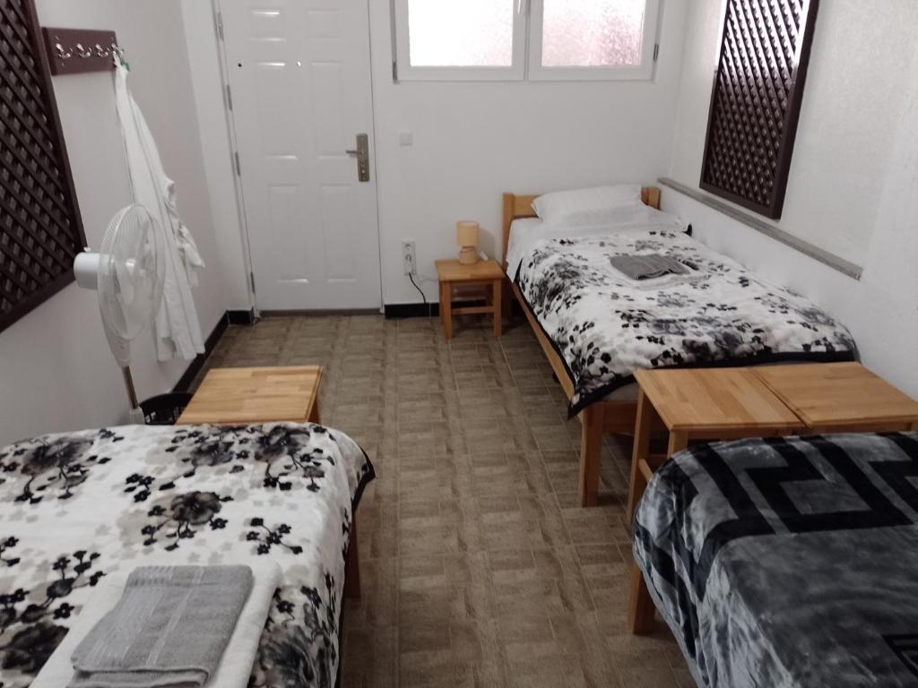 Postel nebo postele na pokoji v ubytování TRIO sobe
