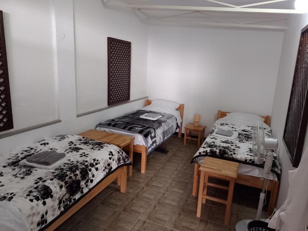Postel nebo postele na pokoji v ubytování TRIO sobe