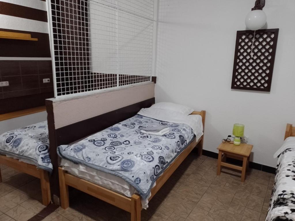 Postel nebo postele na pokoji v ubytování TRIO sobe
