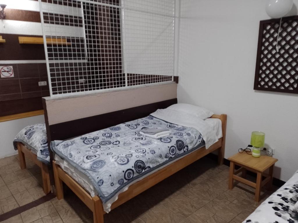 Postel nebo postele na pokoji v ubytování TRIO sobe