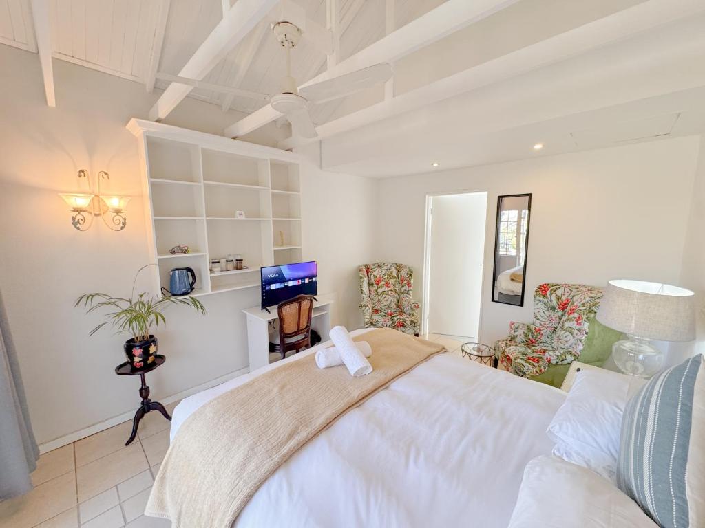 Rúm í herbergi á Amoris Guesthouse Randburg II - Darrenwood