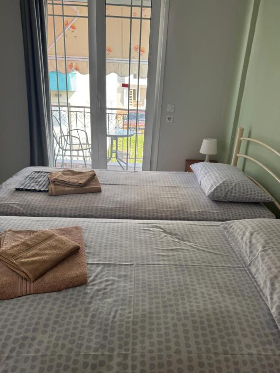 Postel nebo postele na pokoji v ubytování Villa Eleni