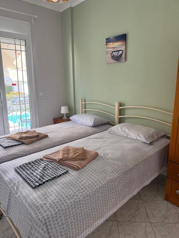 Postel nebo postele na pokoji v ubytování Villa Eleni