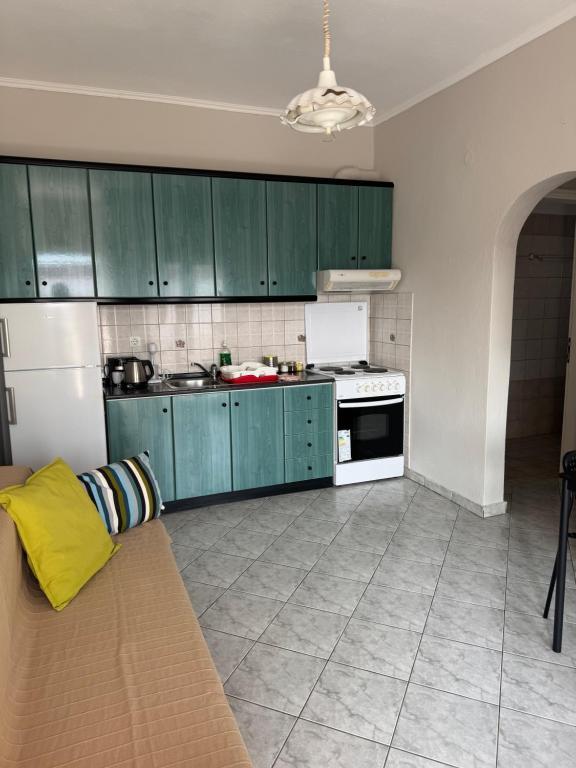Kuchyň nebo kuchyňský kout v ubytování Villa Eleni