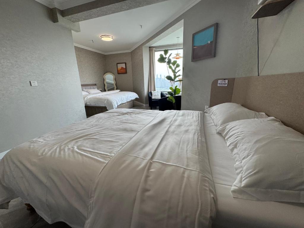 Postel nebo postele na pokoji v ubytování Pujiang Oriental Riverview B&B