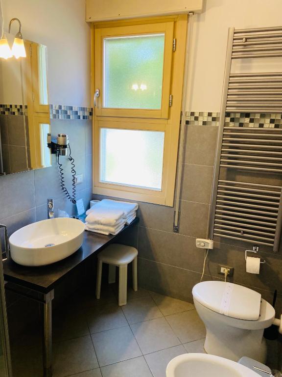 Koupelna v ubytování Hotel Volta