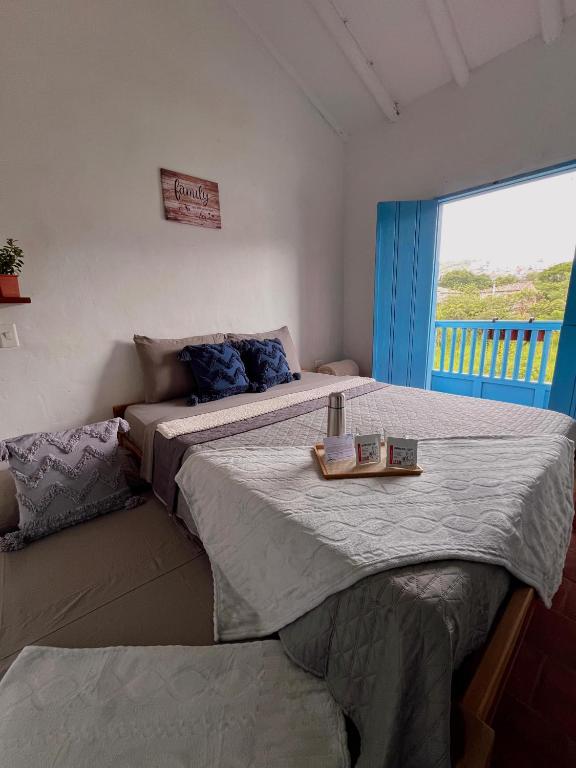 Postel nebo postele na pokoji v ubytování Casa Quintanilla Barichara