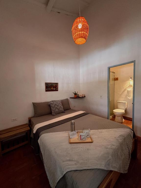 Postel nebo postele na pokoji v ubytování Casa Quintanilla Barichara