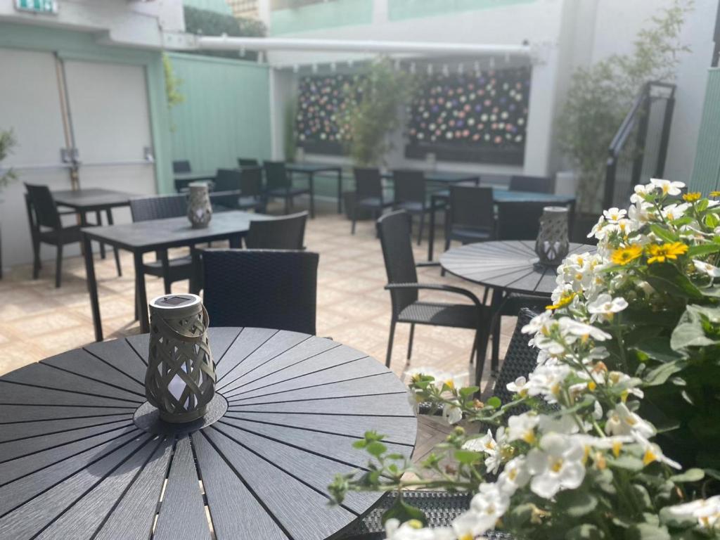 a table with an umbrella sitting on top of it at The Newgrange Hotel in Navan