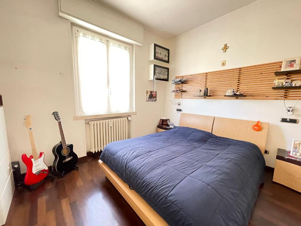 Postel nebo postele na pokoji v ubytování Bianchi BB by Affitti Brevi Rimini