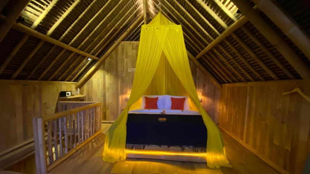 Postel nebo postele na pokoji v ubytování Sandag Jungle