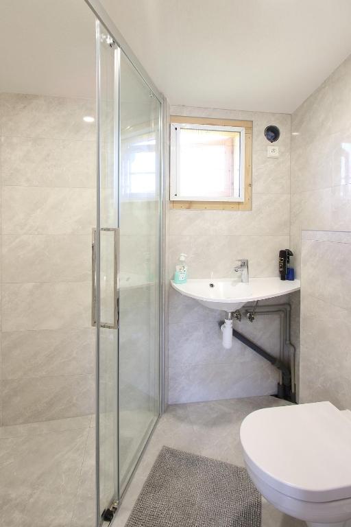 Koupelna v ubytování Apartmány HABURA